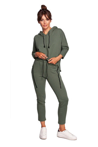 Luxury BeWear Tracksuit Trousers with Decorative Zips and Asymmetrical Stitching - Comfortable Knitted Fabric, featuring a model front-facing in a stylish olive green tracksuit.