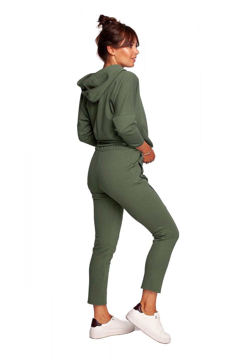Luxury BeWear Tracksuit Trousers with Decorative Zips and Asymmetrical Stitching - Comfortable Knitted Fabric, displayed on a model from the back in a trendy olive green outfit.
