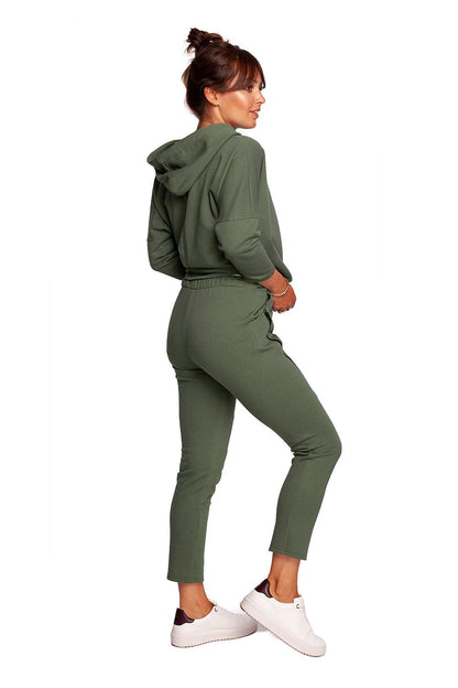 Luxury BeWear Tracksuit Trousers with Decorative Zips and Asymmetrical Stitching - Comfortable Knitted Fabric, displayed on a model from the back in a trendy olive green outfit.