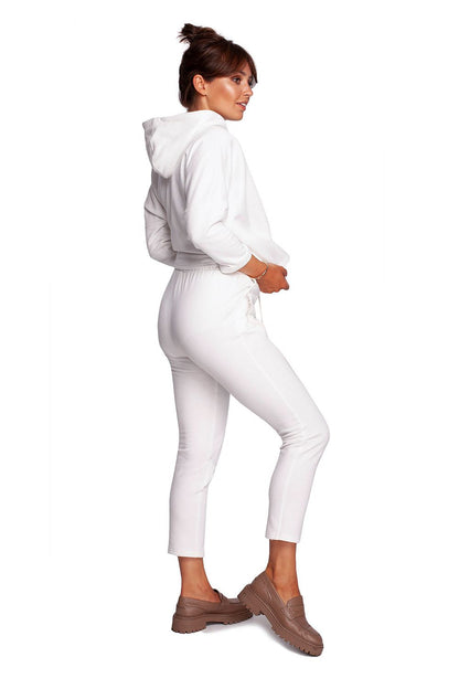 Luxury BeWear Tracksuit Trousers with Decorative Zips and Asymmetrical Stitching - Comfortable Knitted Fabric, shown on a model from behind in a classy white tracksuit.