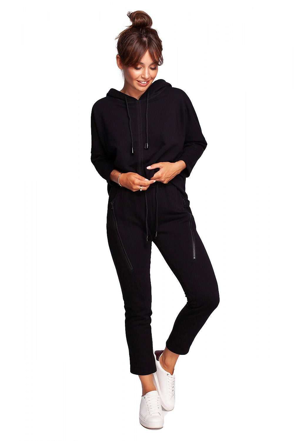 Luxury BeWear Tracksuit Trousers with Decorative Zips and Asymmetrical Stitching showcased on a model, featuring a comfortable knitted fabric and paired with a stylish hoodie for a chic loungewear look.