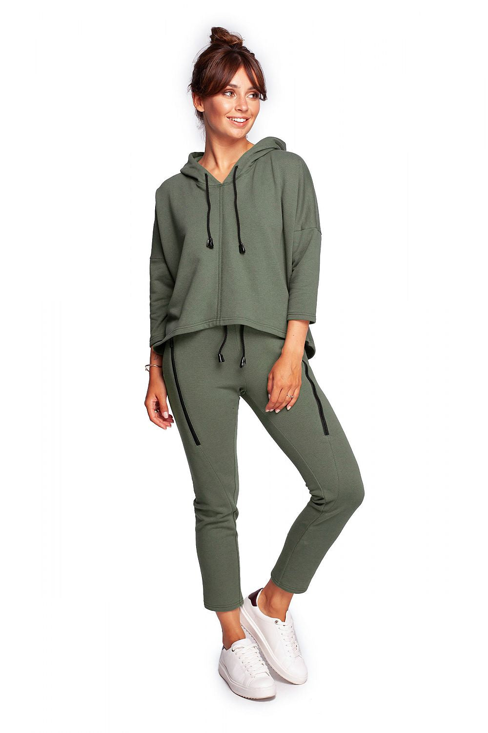 Fashionable BeWear Loose-Fitting Trapeze Sweatshirt in Soft Knit with Hood and Faux Leather Accents showcased in a vibrant green, complementing matching bottoms.