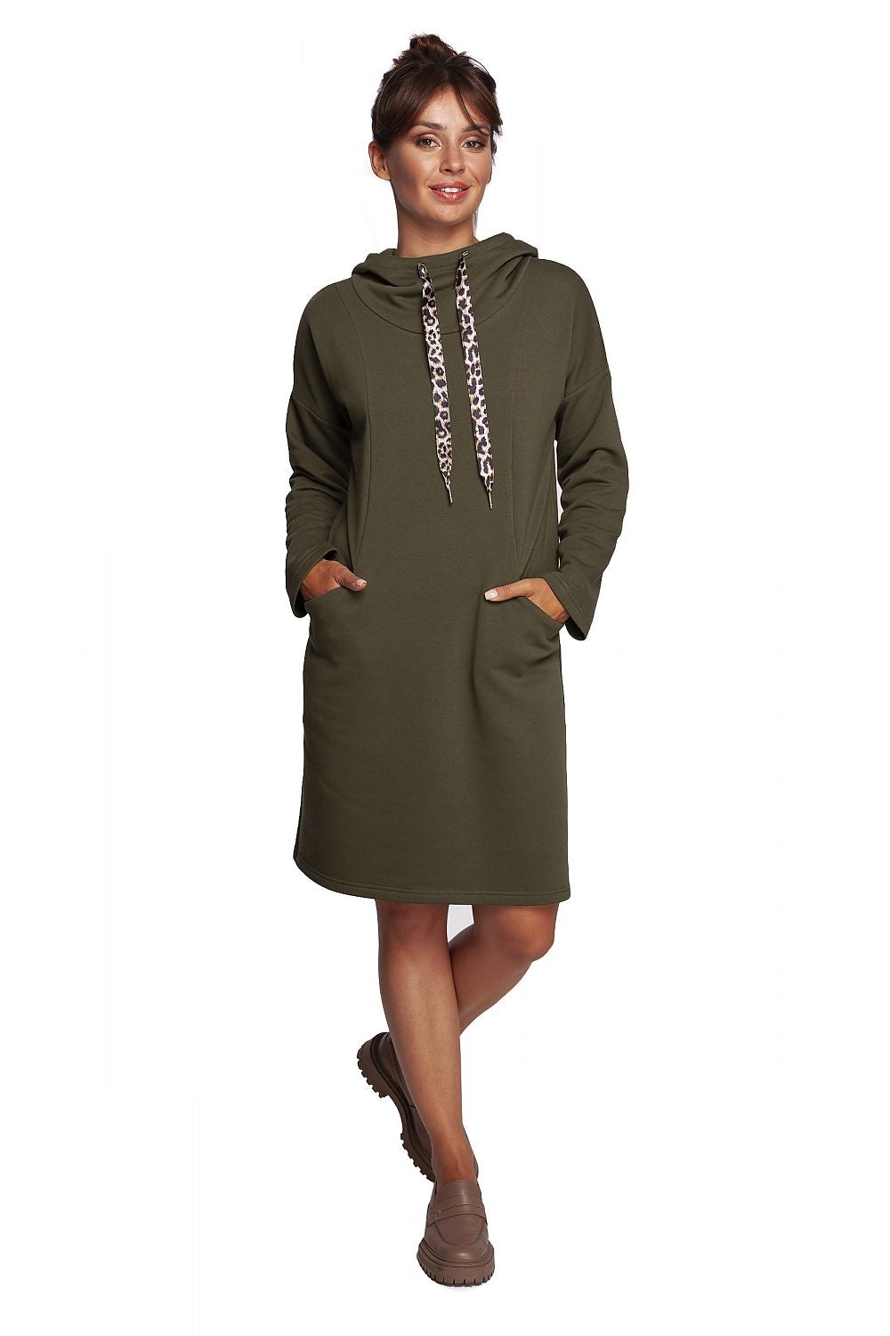 BeWear Casual Daydress with High Collar, featuring decorative leopard-print ribbons, a stylish hood, and hidden pockets, showcased by a model in an olive green hue.