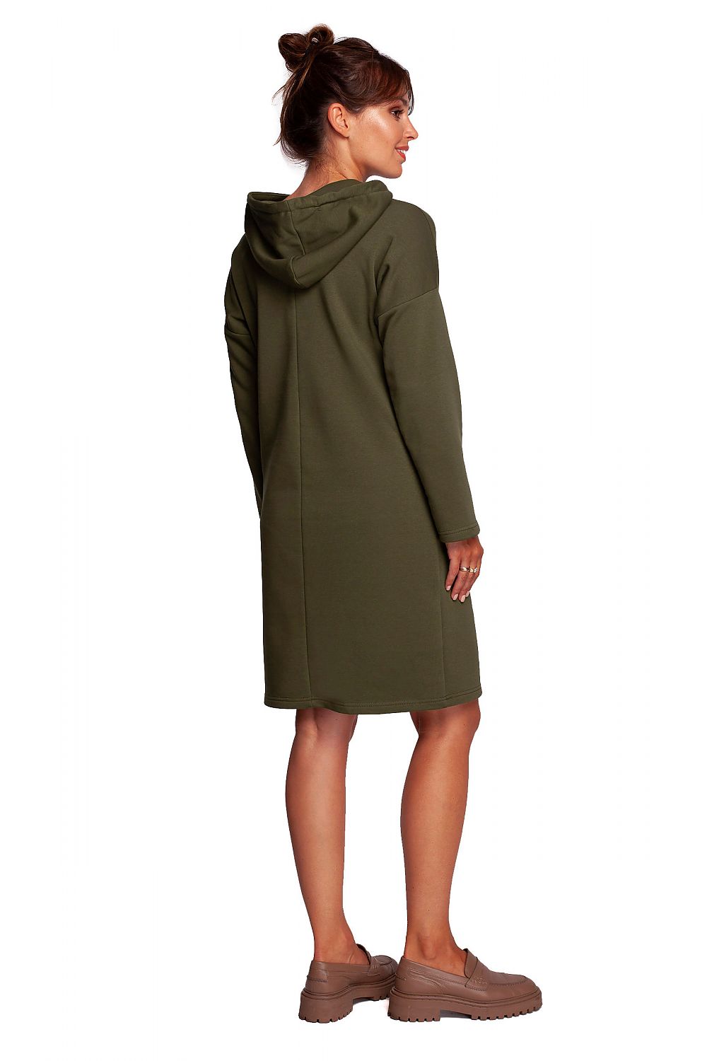 BeWear Casual Daydress with High Collar, highlighting the back view, elegantly designed with a hood and hidden pockets, worn by a model in olive green.