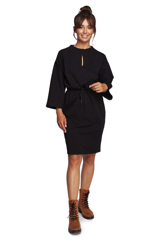 Elegant BeWear Daydress with Teardrop Neckline and Sporty Accents in Soft Knit Fabric, showcasing a model wearing the dress in black, complete with 3/4 sleeves and a cinched waist, perfect for stylish comfort.
