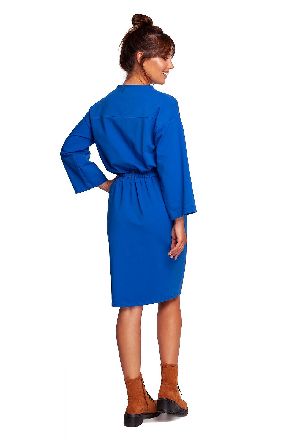 Elegant BeWear Daydress with Teardrop Neckline and Sporty Accents in Soft Knit Fabric, featuring a model demonstrating the back view of the blue dress.