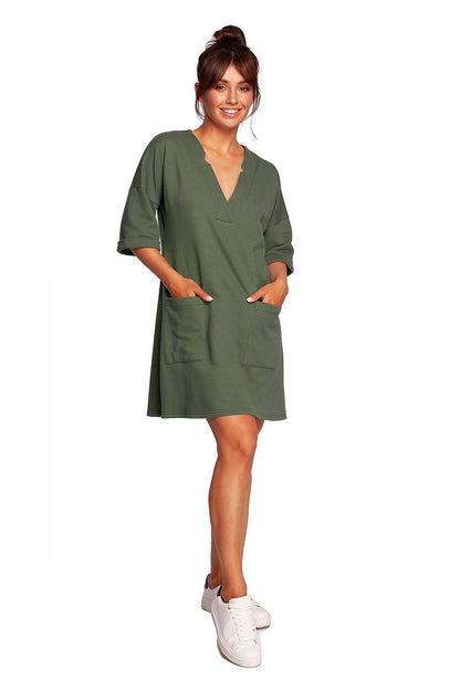 Elegant Heart Neckline Daydress by BeWear in lush green, showcasing a relaxed silhouette with hip pockets and stylish elbow-length sleeves for everyday elegance.