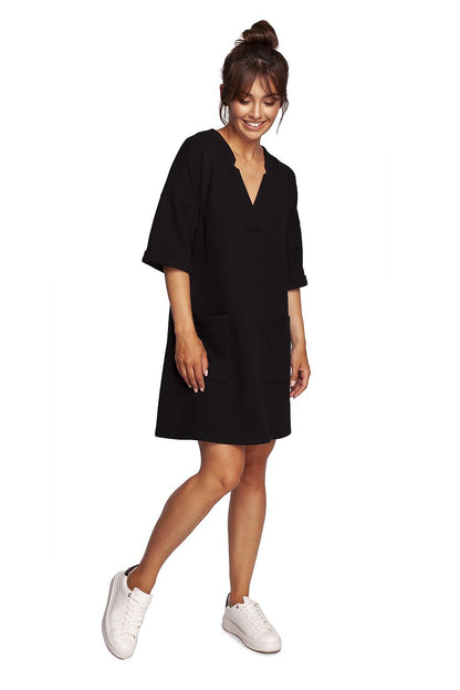 Elegant Heart Neckline Daydress by BeWear featuring elbow-length sleeves and side pockets, showcased in black against a minimalist background.