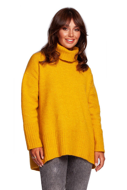 Luxury Turtleneck Knit Sweater with Ribbed Hem and Back Slit - Soft Warm Acrylic Blend, model presenting the vibrant yellow colour option, showcasing a relaxed fit and stylish design.