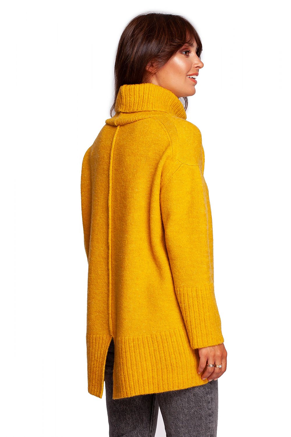 Luxury Turtleneck Knit Sweater with Ribbed Hem and Back Slit - Soft Warm Acrylic Blend, featuring a chic back view with slit detail, model adorned in striking yellow creates a fashionable statement.