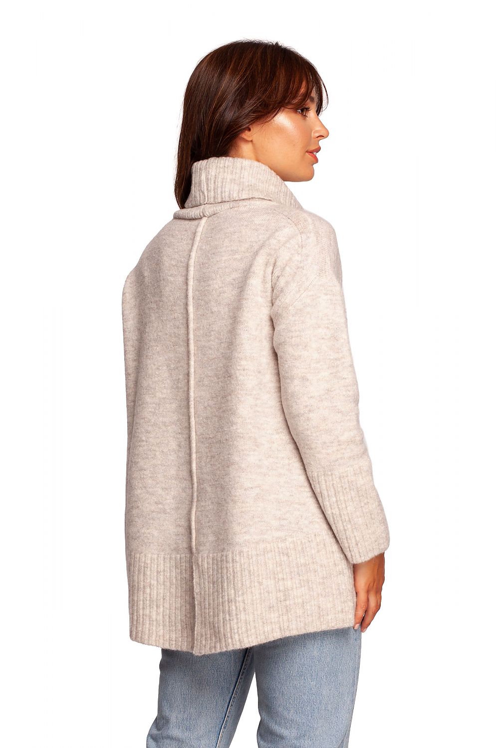 Luxury Turtleneck Knit Sweater with Ribbed Hem and Back Slit - Soft Warm Acrylic Blend, highlighting the back slit design showcased by the model.