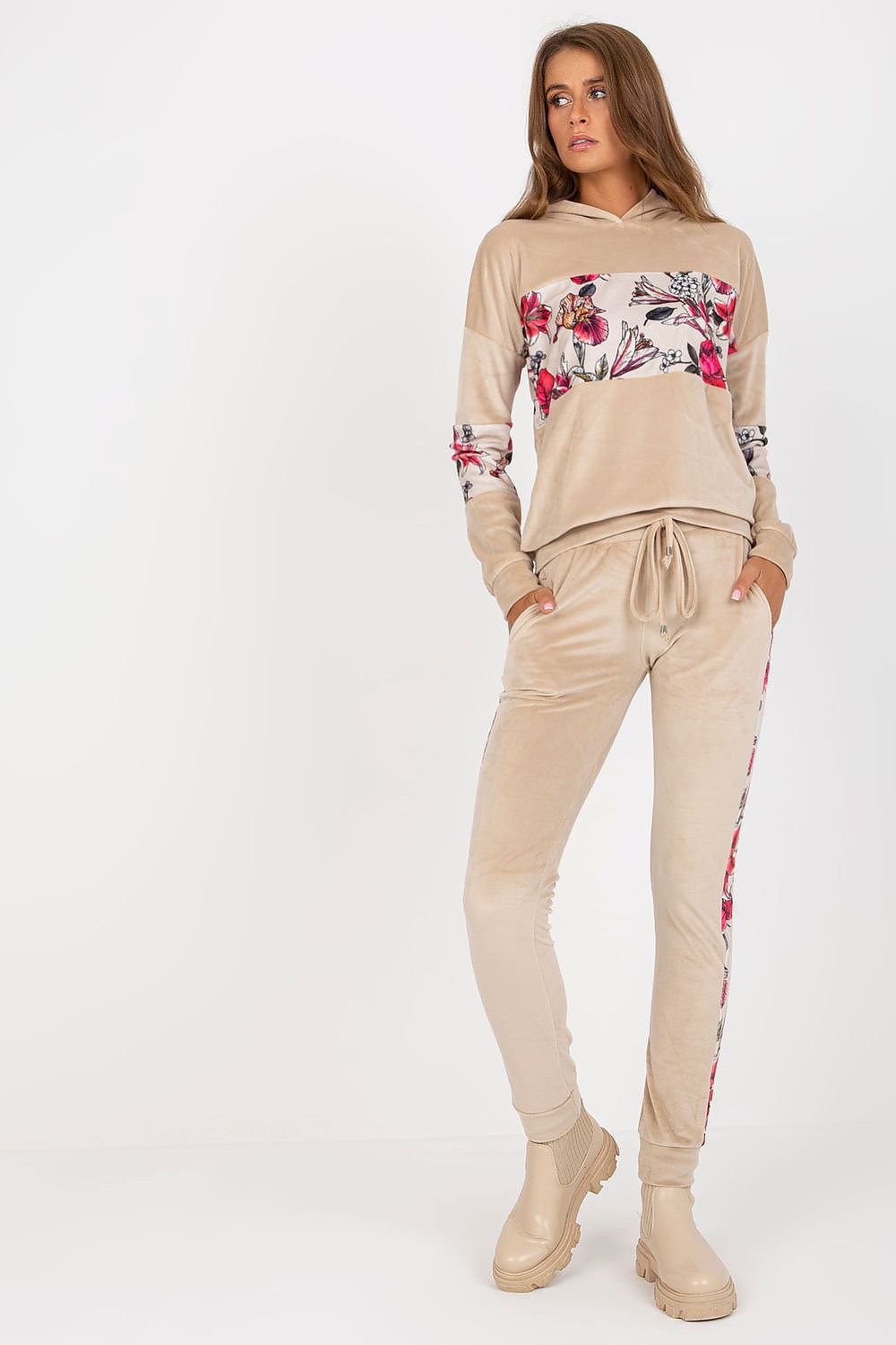 Luxurious Velour Travel Set in a soft beige tone, showcasing a sweatshirt with floral detailing and long pants, designed for opulent relaxation.