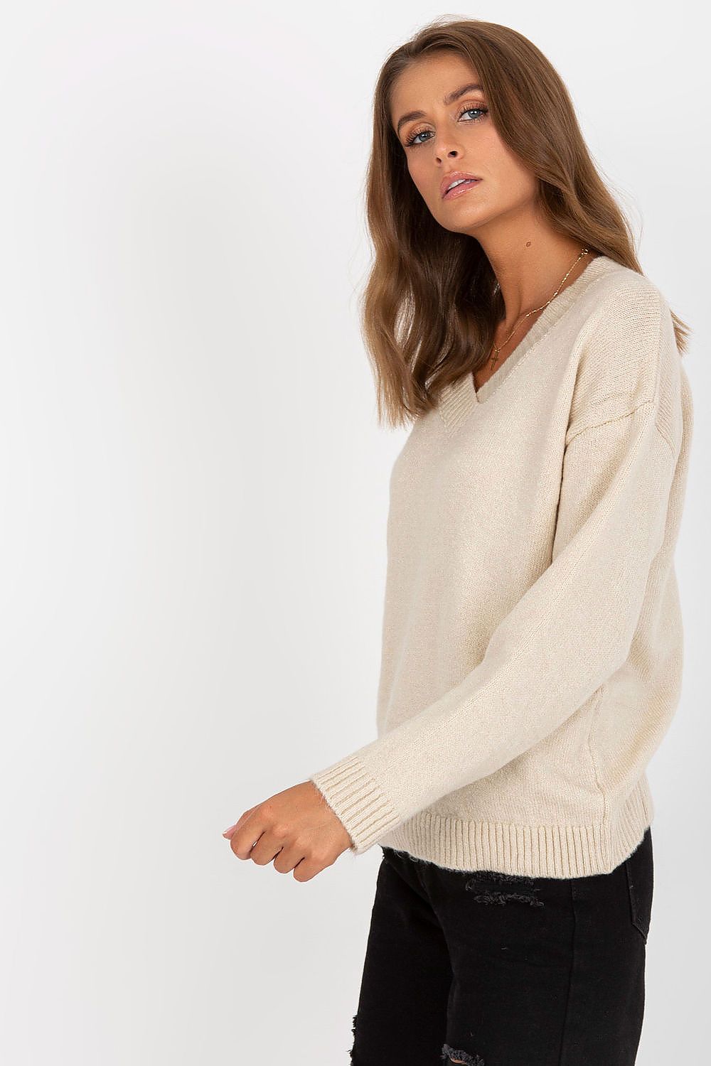 Elegant Women's Long Sleeve Sweater with Heart Neckline by Rue Paris - A sophisticated model displaying the beige version of this chic sweater, ideal for versatile styling.