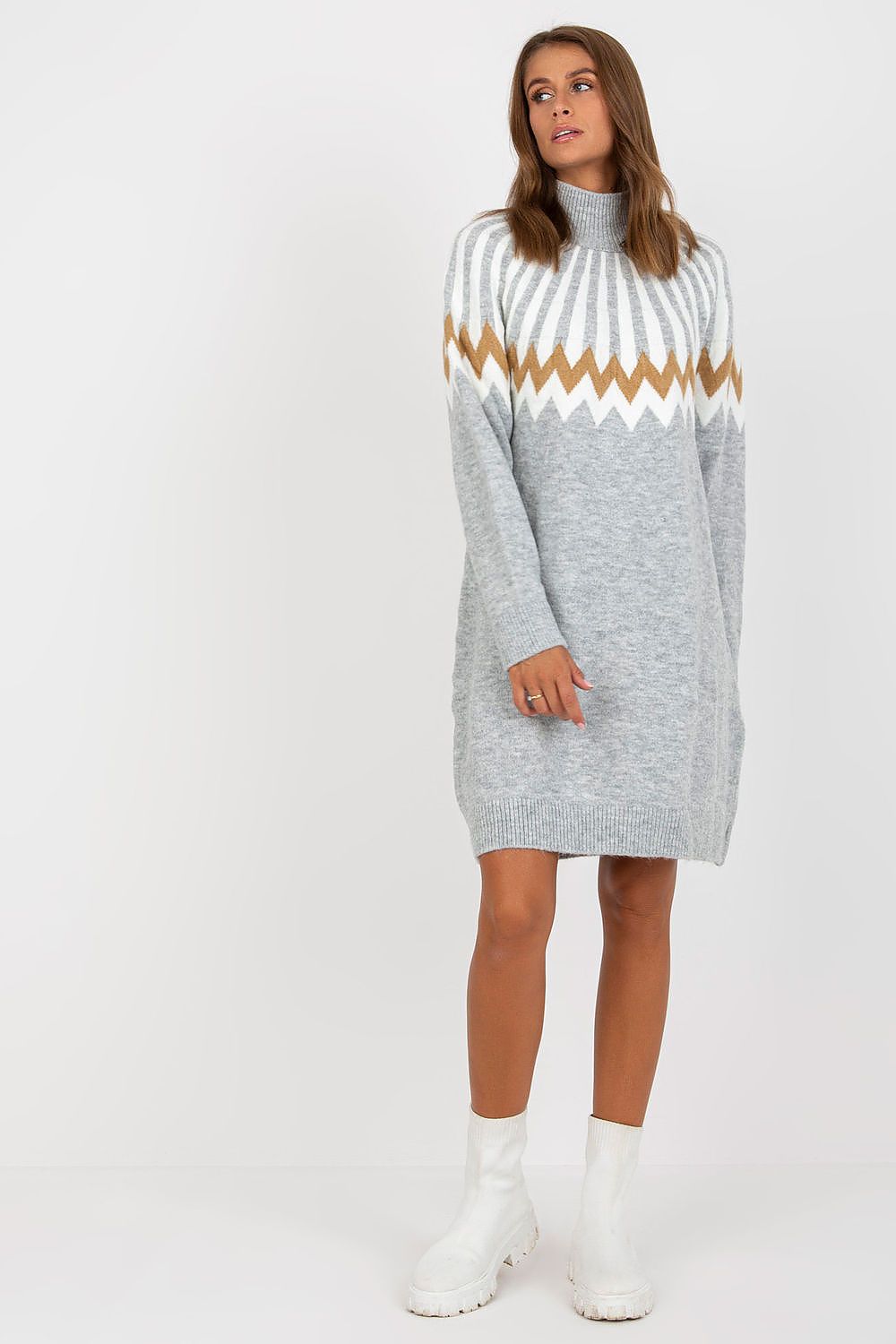 Sophisticated grey geometric pattern knitted daydress with long sleeves and a turtleneck by Rue Paris, elegantly worn with stylish white boots.