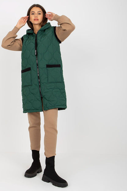 Luxurious Quilted Hooded Gilet by Rue Paris showcased on a model, featuring an elegant design with zippered pockets and stylish quilted texture, ideal for a chic and insulated outfit.