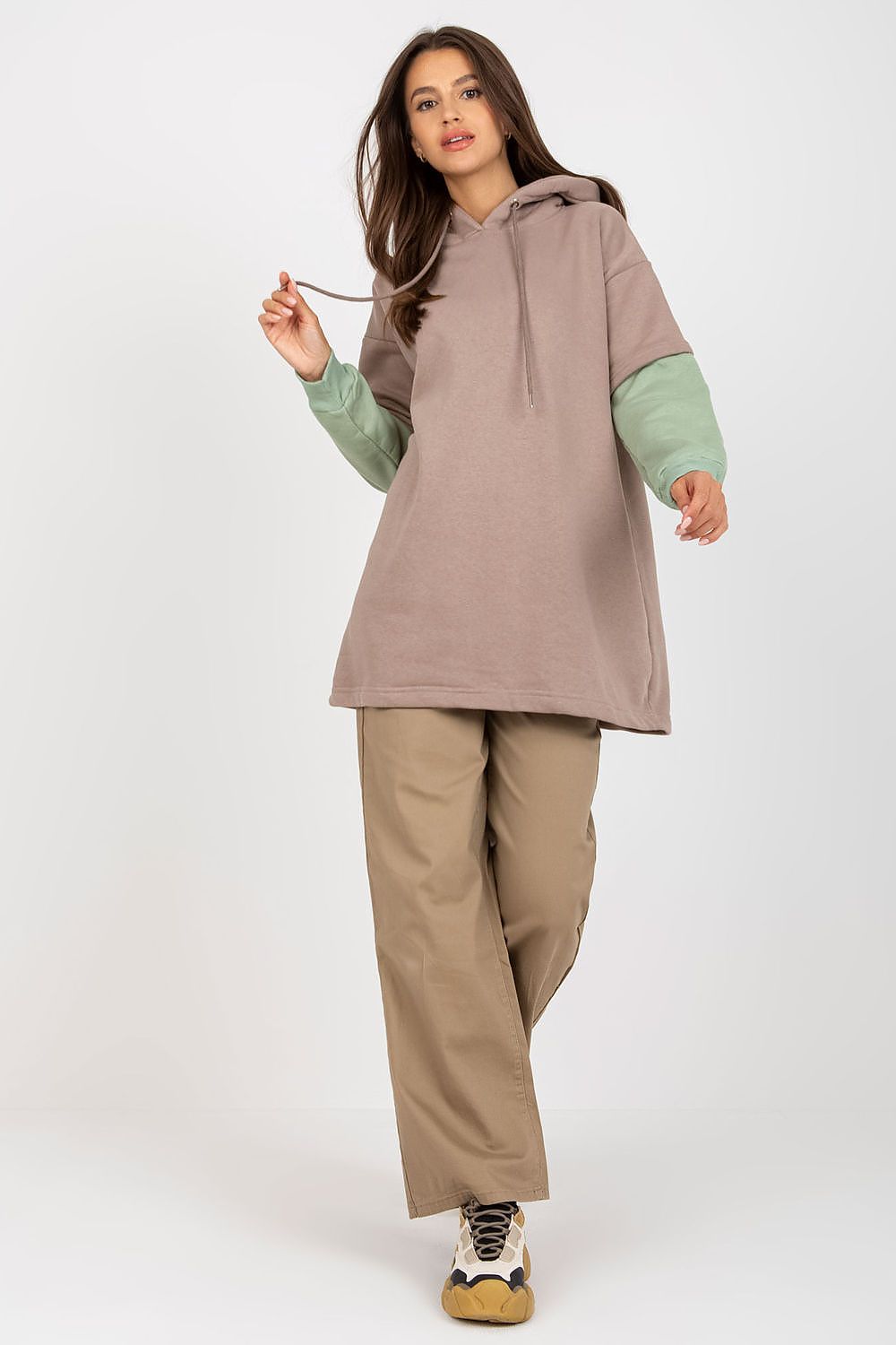 Luxury Women's Rue Paris Cotton Blend Sweatshirt with Hood, Extended Cut and Long Sleeves - Model posing in a stylish, oversized sweatshirt featuring a hood and long sleeves.