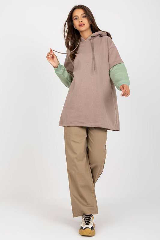 Luxury Women's Rue Paris Cotton Blend Sweatshirt with Hood, Extended Cut and Long Sleeves - Model posing in a stylish, oversized sweatshirt featuring a hood and long sleeves.