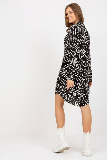 Back view of the Elegant Long-Sleeved Button-Down Shirt Dress by Rue Paris, highlighting the exquisite tailoring and unique pattern.