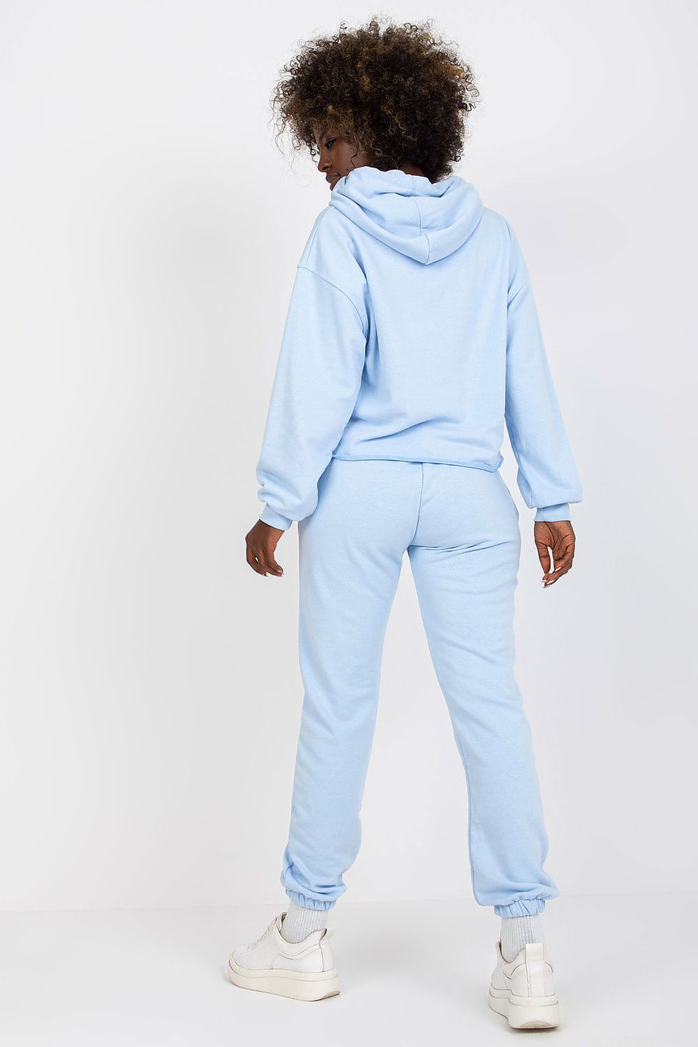 Luxury Ex Moda Sweatshirt Set with Hooded Long Sleeve Top and High Waist Pants, featuring a model from the back, showcasing the relaxed silhouette and luxurious fabric of the light blue set, perfect for casual outings.