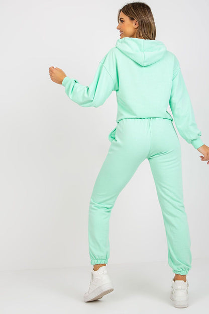 Luxury Ex Moda Sweatshirt Set With Hooded Long Sleeve Top And High Waist Pants, back view of model displaying the mint green set with a cozy hooded sweatshirt and elegant high waist pants.