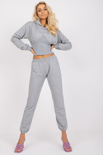 Luxury Ex Moda Cotton-Blend Sweatshirt Set with Corset Insert & Elastic Waist Pants showcased by a model in light grey, featuring a chic cropped hoodie and comfortable pants, styled with fashionable purple heels.