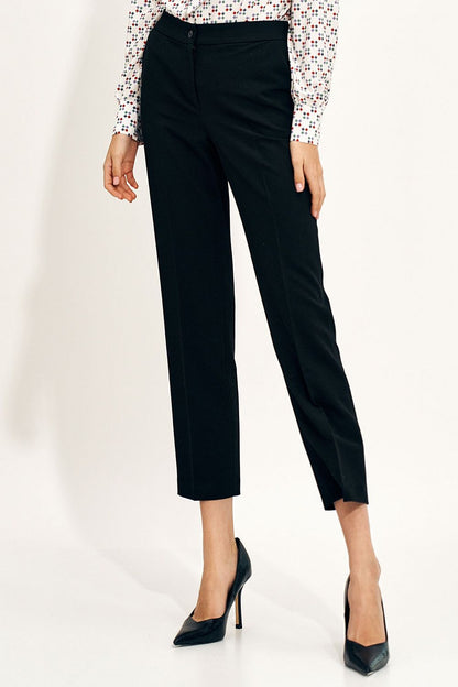 Nife Women's Chino Trousers with Elastic Waistband and Pockets - Elegant Fit for Modern Style, showcasing feminine black trousers paired with a stylish floral blouse and elegant heels.