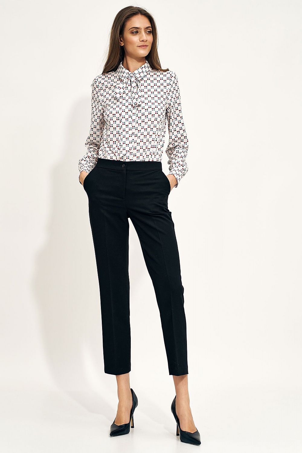 Nife Women's Chino Trousers with Elastic Waistband and Pockets - Elegant Fit for Modern Style, featuring a refined look with a woman in a printed blouse and tailored black trousers.