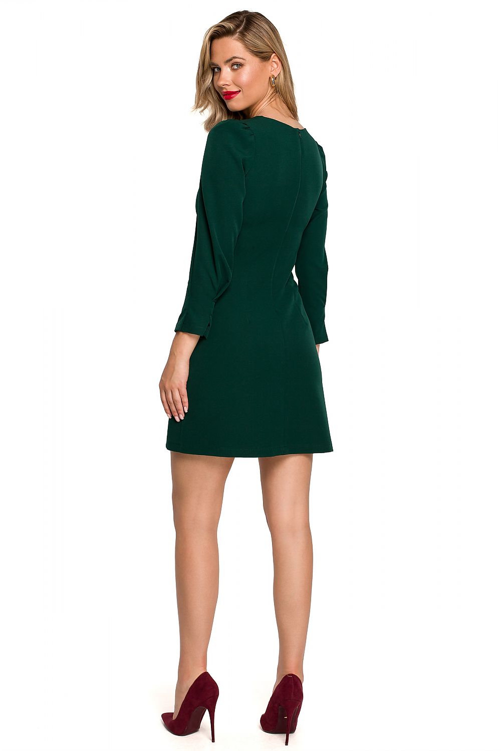 Back view of the Timeless Mini Dress with Patch Details and Elegant Pleats by Makover in green, showcasing the elegant fit and zipper styling, ideal for upscale events.