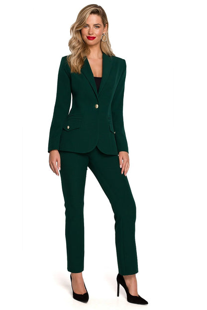 Elegant Makover Jacket with Metal Decorative Buttons – Perfect Cut and Fully Lined Design full-body view of a model showcasing a green jacket and trousers, radiating a confident and elegant look.