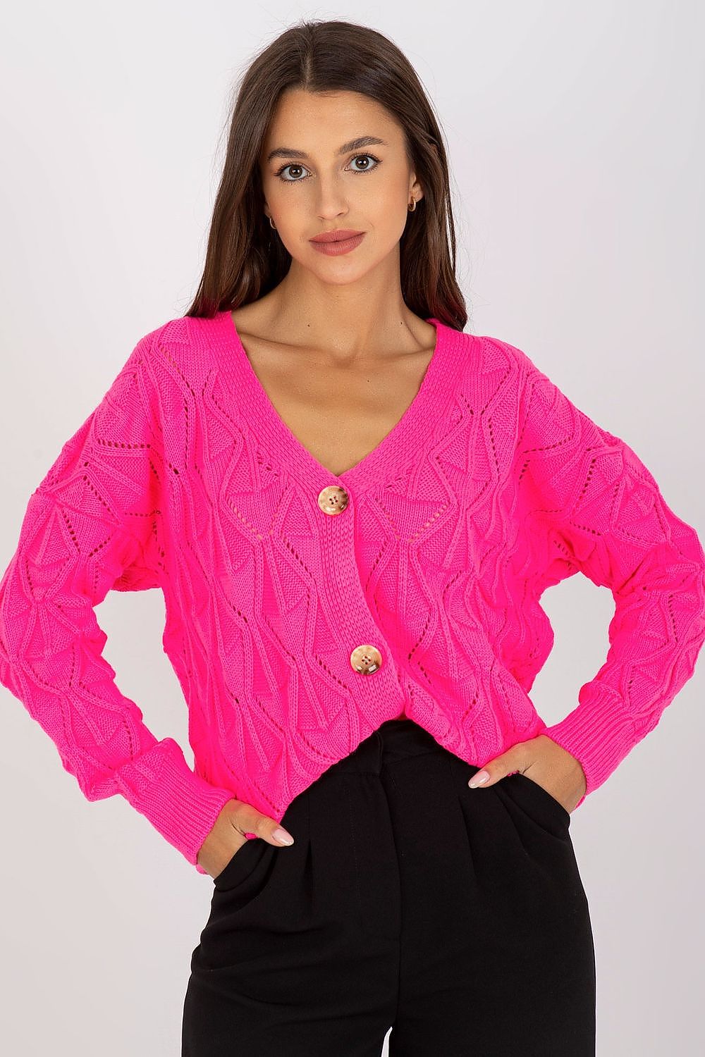 Luxurious Women's Button-Down Cardigan Sweater by Rue Paris with Openwork Pattern, featured in vibrant pink, styled with a chic black outfit for a fashionable look.