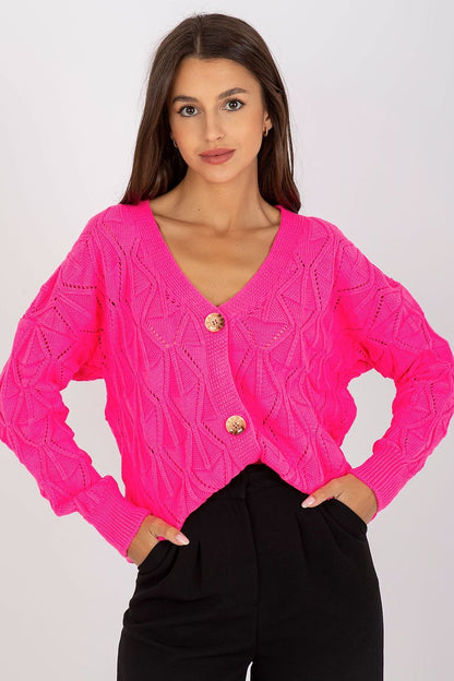 Luxurious Women's Button-Down Cardigan Sweater by Rue Paris with Openwork Pattern, featured in vibrant pink, styled with a chic black outfit for a fashionable look.