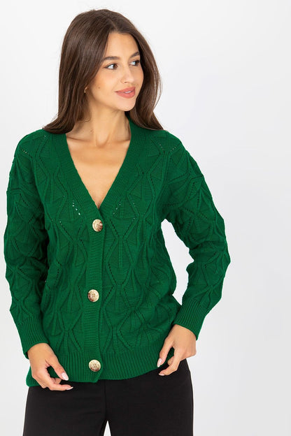 Luxurious Women's Button-Down Cardigan Sweater by Rue Paris with Openwork Pattern, pictured in a rich green hue, paired beautifully with chic black trousers.