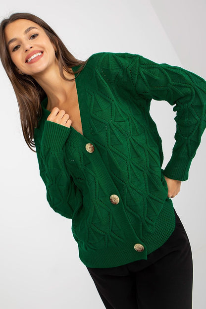 Luxurious Women's Button-Down Cardigan Sweater by Rue Paris with Openwork Pattern, featuring a model smiling while showcasing the vibrant green sweater with elegant button details.
