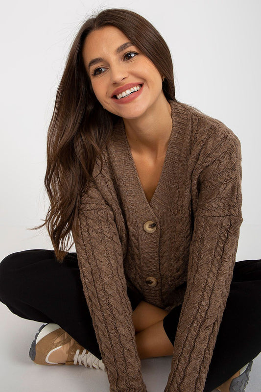 Elegant Women's Long Sleeve Acrylic Cardigan with Button Closure by Rue Paris, showcased with a stylish model smiling, wearing a brown cardigan with a cable knit pattern, perfect for chic autumn outfits.