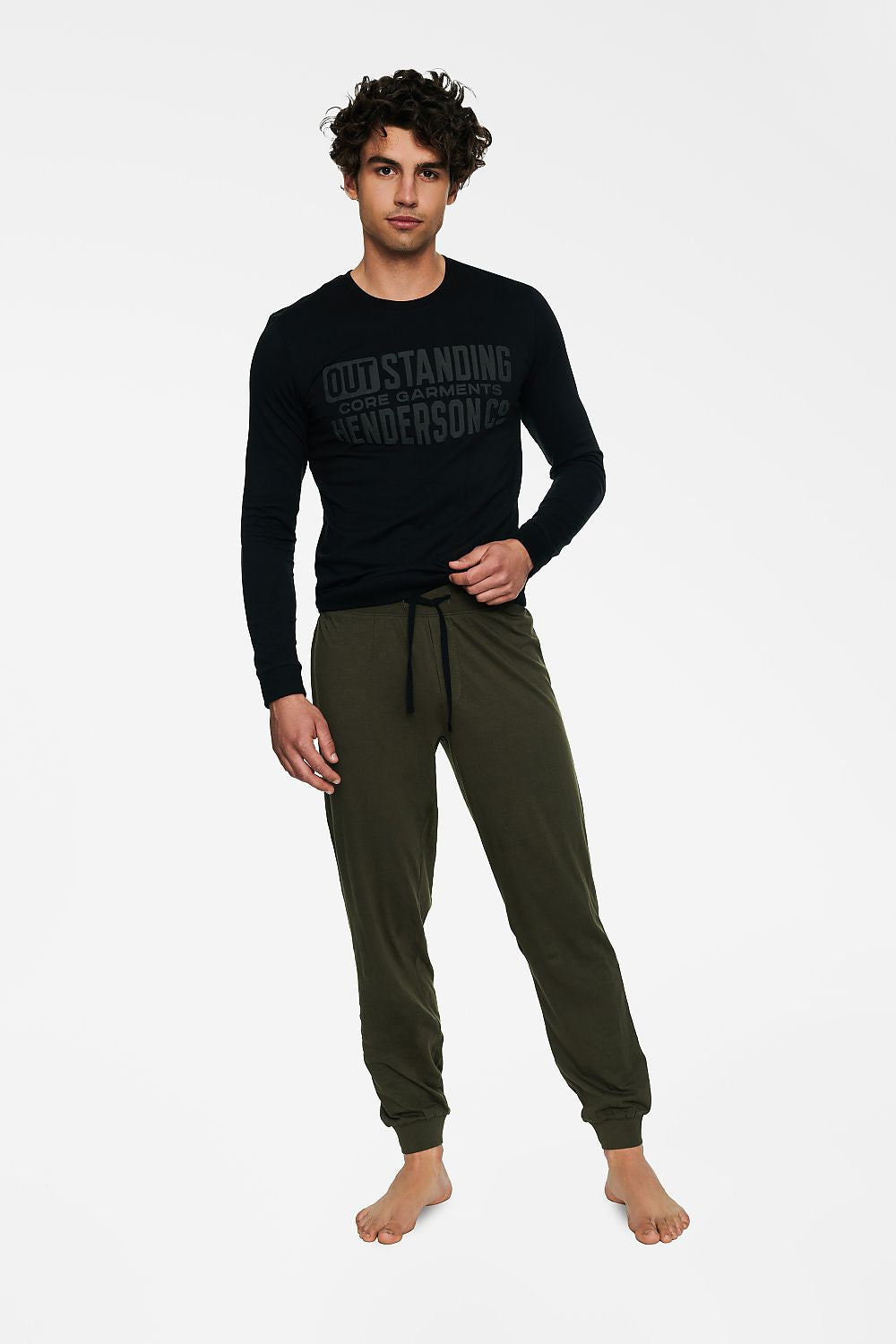 Luxury Men's Cotton Pyjamas Set showcasing a long-sleeved black sweatshirt with embossed design and stylish olive green pants, crafted by Henderson for superior comfort.