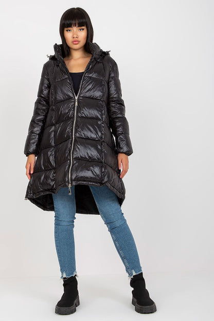 Elegant Women's Quilted Nylon Coat with Detachable Hood and Zippered Pockets showcased on a model, embodying luxurious outerwear fashion.