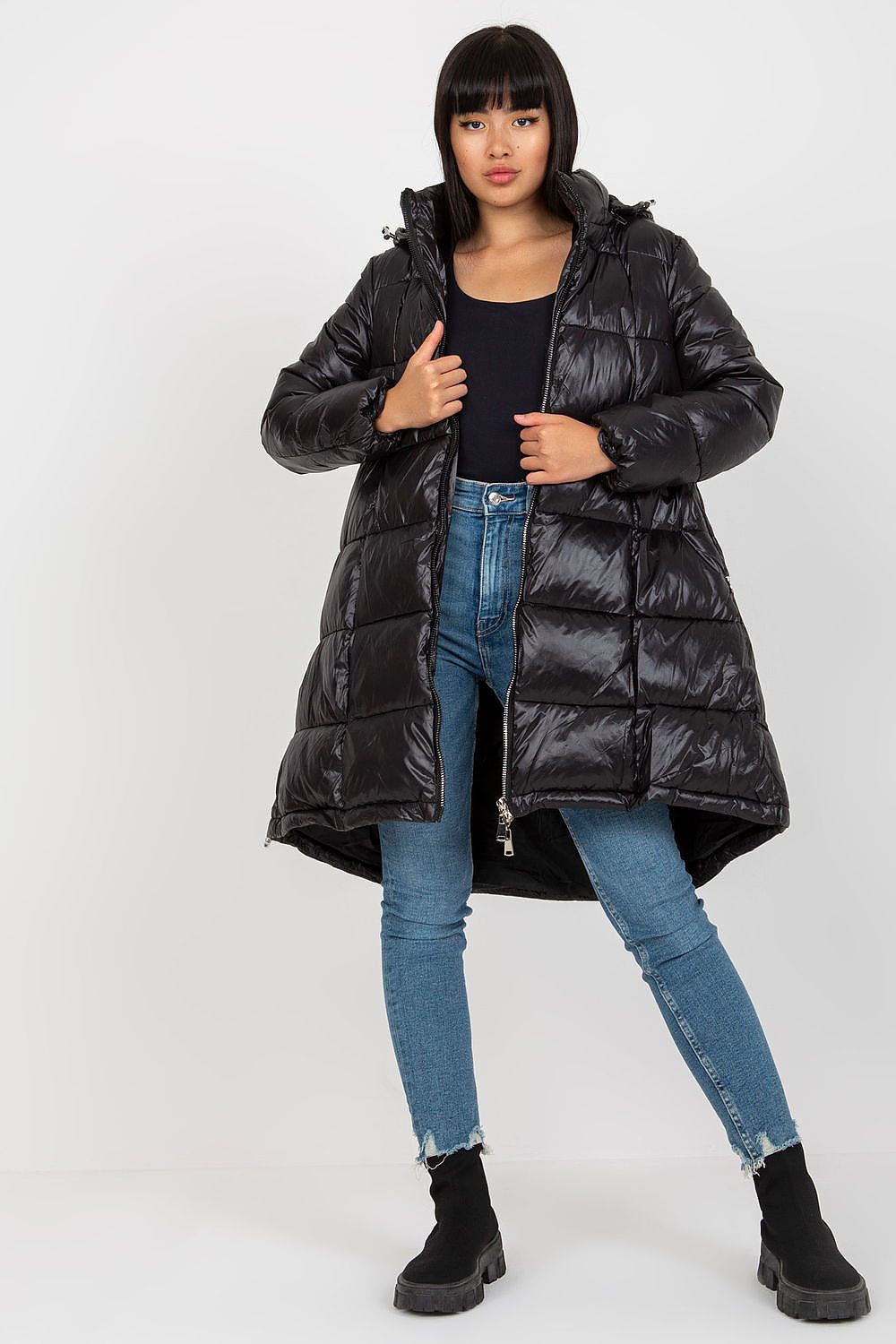 Stunning Women's Quilted Nylon Coat with Detachable Hood and Zippered Pockets, worn by a model, highlighting sophisticated outerwear design.