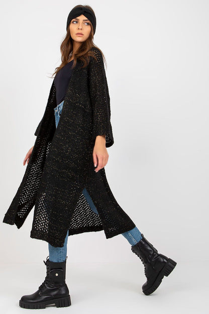 Elegant Openwork Long Sleeve Cardigan by Och Bella in black, displayed in a fashionable side pose to highlight the chic design and texture of the knitwear.