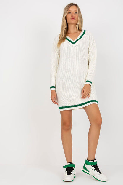 Elegant Rue Paris Knit Dress with Long Sleeves and Heart Neckline - Perfect for Any Occasion, featured in a stylish outfit with a model showcasing a cream dress with green trim and sporty sneakers.