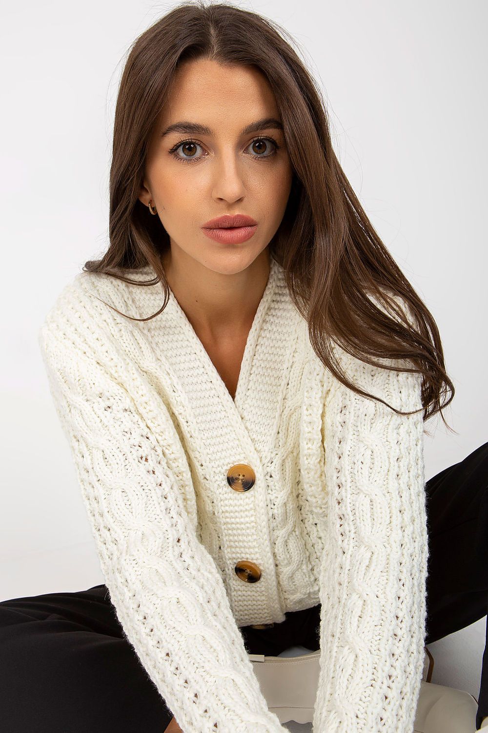 Close-up of the Elegant Women's Heart Neckline Cardigan in 100% Acrylic by Rue Paris, showcasing beautiful knitted texture and button details, perfect for a stylish look.