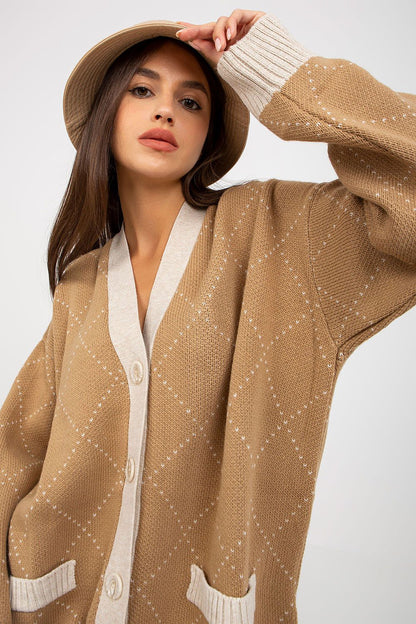 Elegant Women's Long Sleeve Buttoned Cardigan With Imitation Pockets by Rue Paris, featuring a sophisticated tan colour, oversized fit, and stylish details including a soft v-neckline and delicate diamond pattern. Perfect for adding a touch of luxury to any wardrobe.