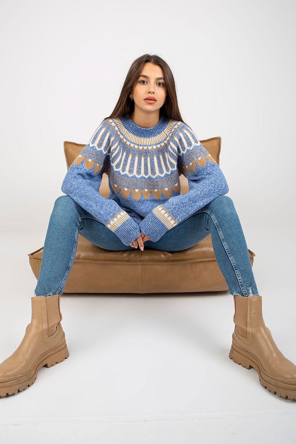 Luxury Women's Stand-Up Collar Sweater with Decorative Pattern by Rue Paris, displayed in blue, styled with jeans and beige boots, showcasing a chic and elegant look.