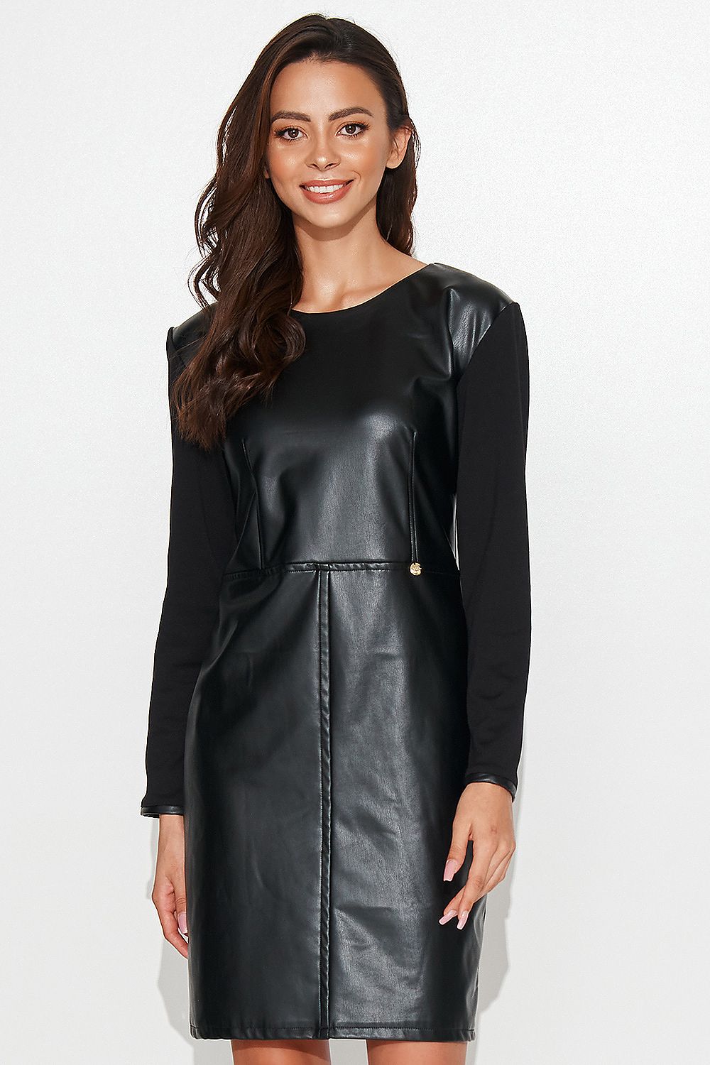 Luxurious Numinou black short dress featuring a leather front and knitted back, designed for elegance and comfort, suitable for parties or office wear.