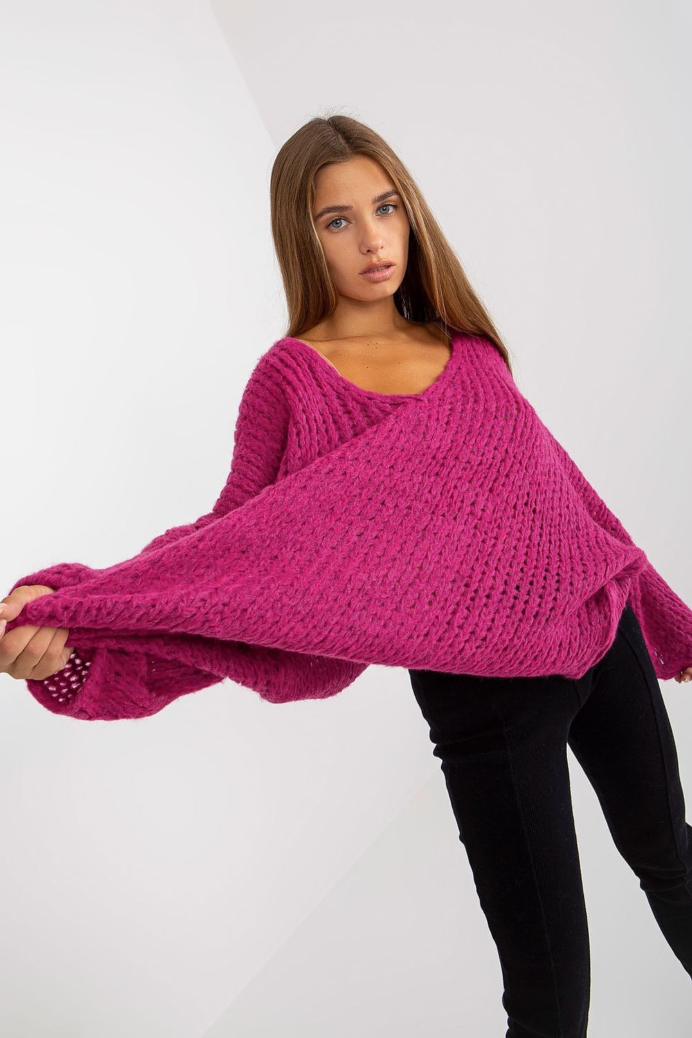 Luxury Women's Loose Fit Sweater With Heart Neckline & Asymmetrical Hem By Och Bella in vibrant pink, featuring wide long sleeves and a relaxed silhouette, ideal for chic casual wear.