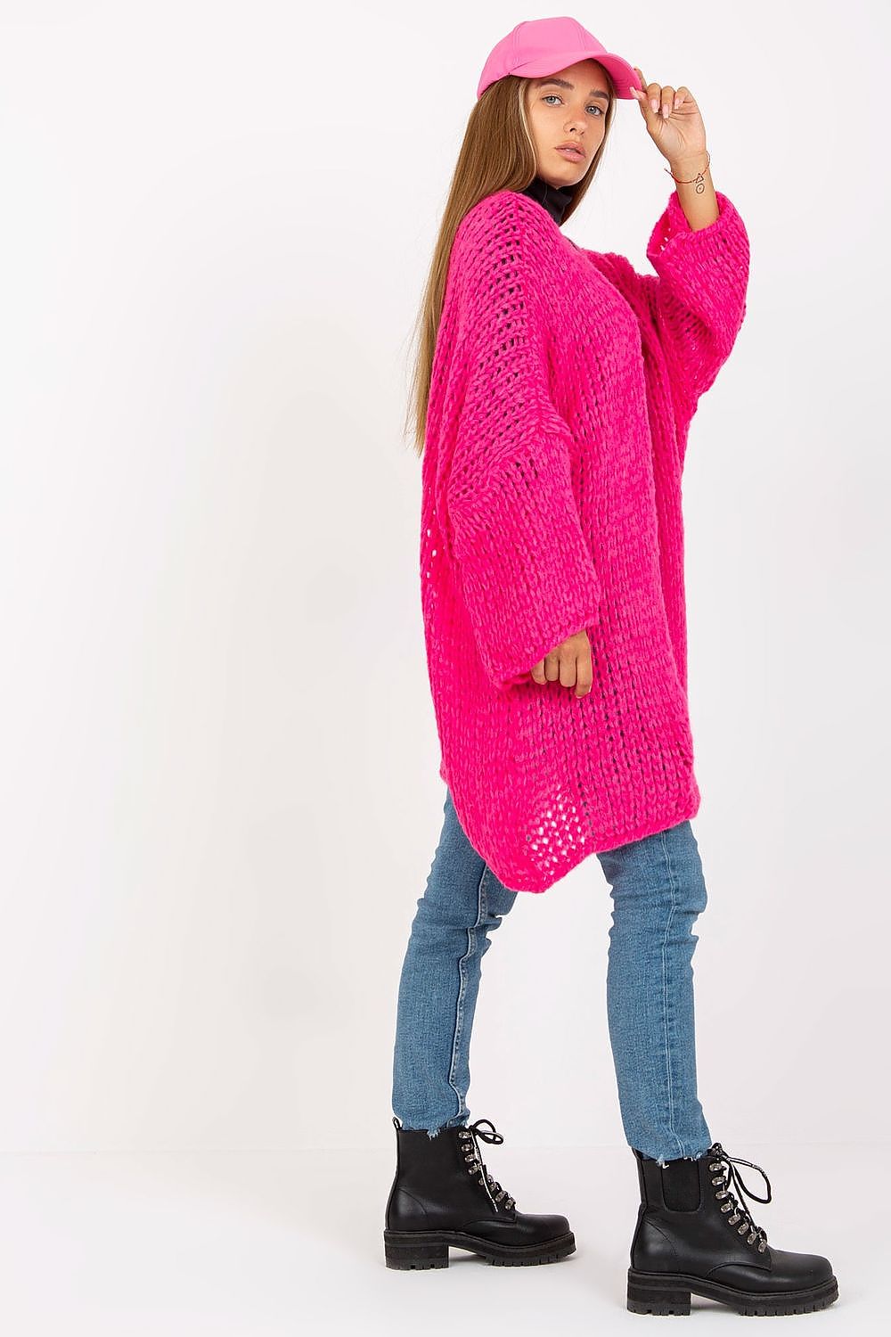 Luxury Women's Long Sleeve Cardigan by Och Bella showcased on model, featuring a vibrant pink knitted design paired with casual denim and black boots, epitomising elegance and style.