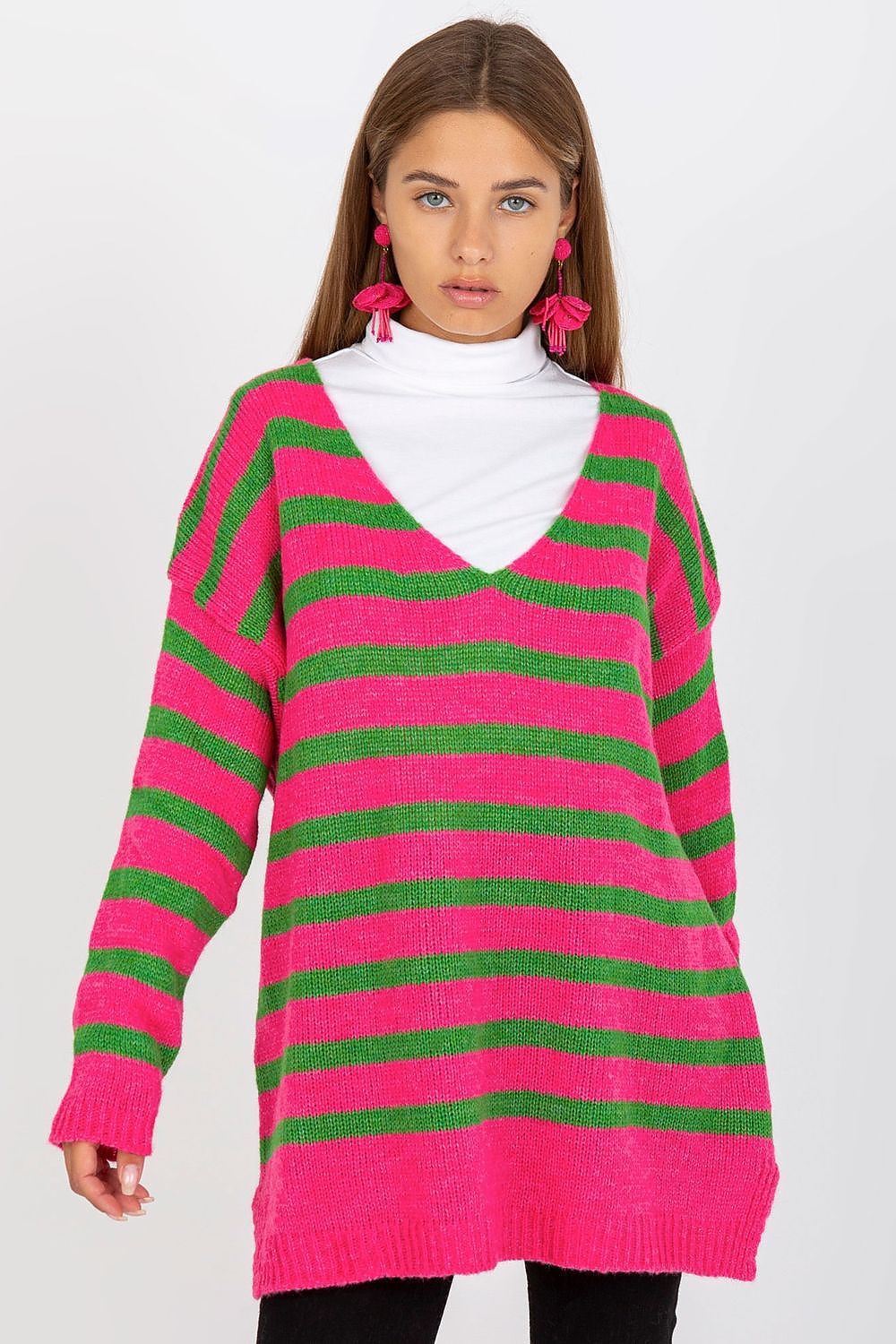 Och Bella Women's Colourful Striped Sweater with Long Sleeves and V-Neck Design, showcasing a model wearing a striking pink and green striped sweater paired with a white turtleneck.