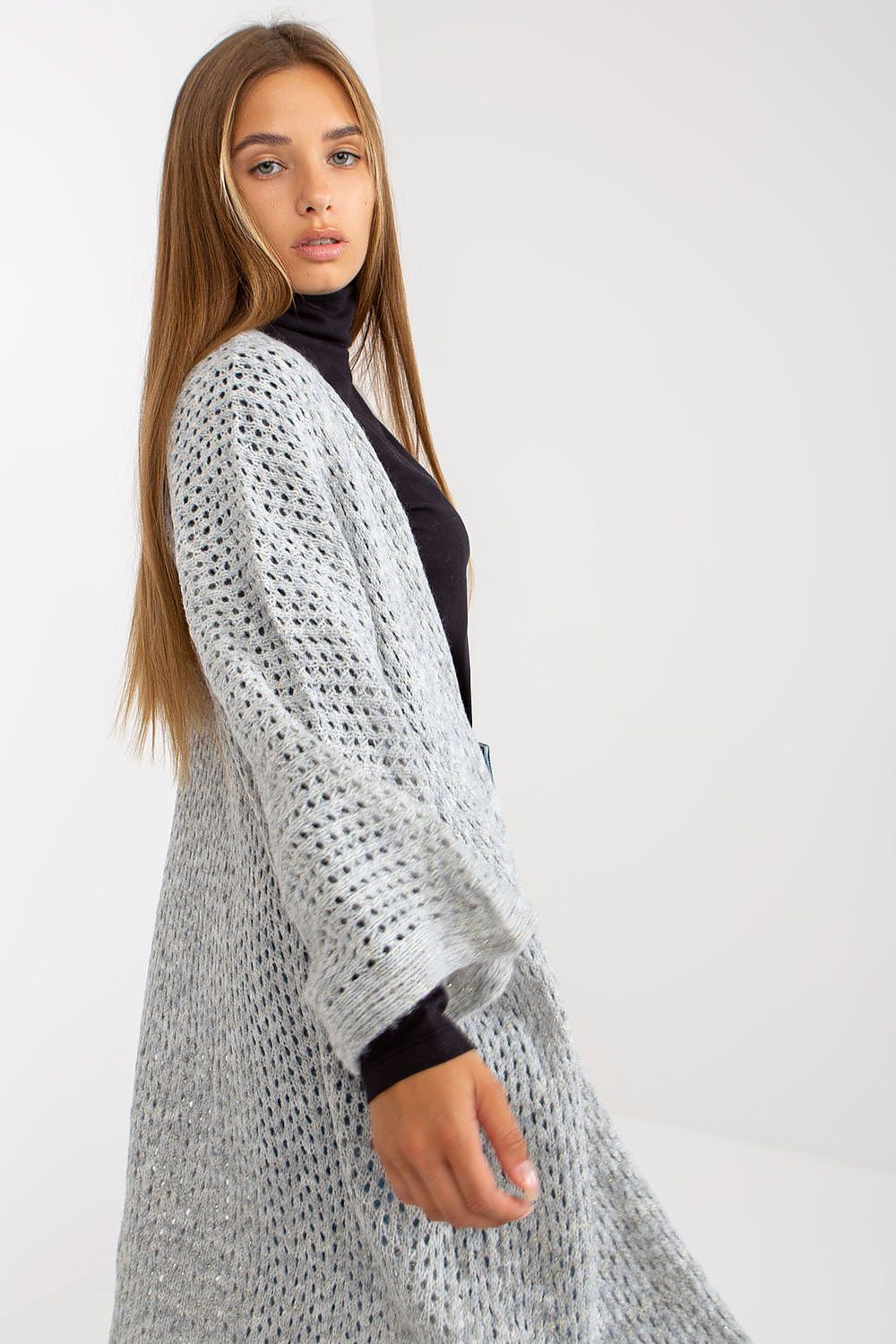 Stylish presentation of the Elegant Openwork Long Sleeve Cardigan by Och Bella in grey, focusing on the intricate knitting pattern and luxurious fit.