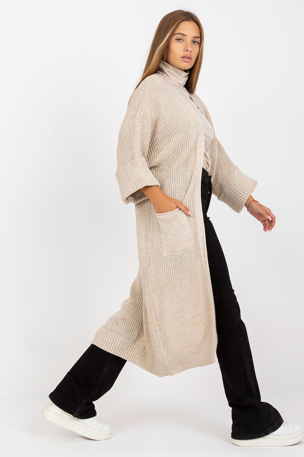Luxury 3/4 Sleeve Long Unbuttoned Cardigan by Och Bella with Slip Pockets in Acrylic and Wool Blend, displayed elegantly on a model in a light beige colour, paired with black wide-leg pants.