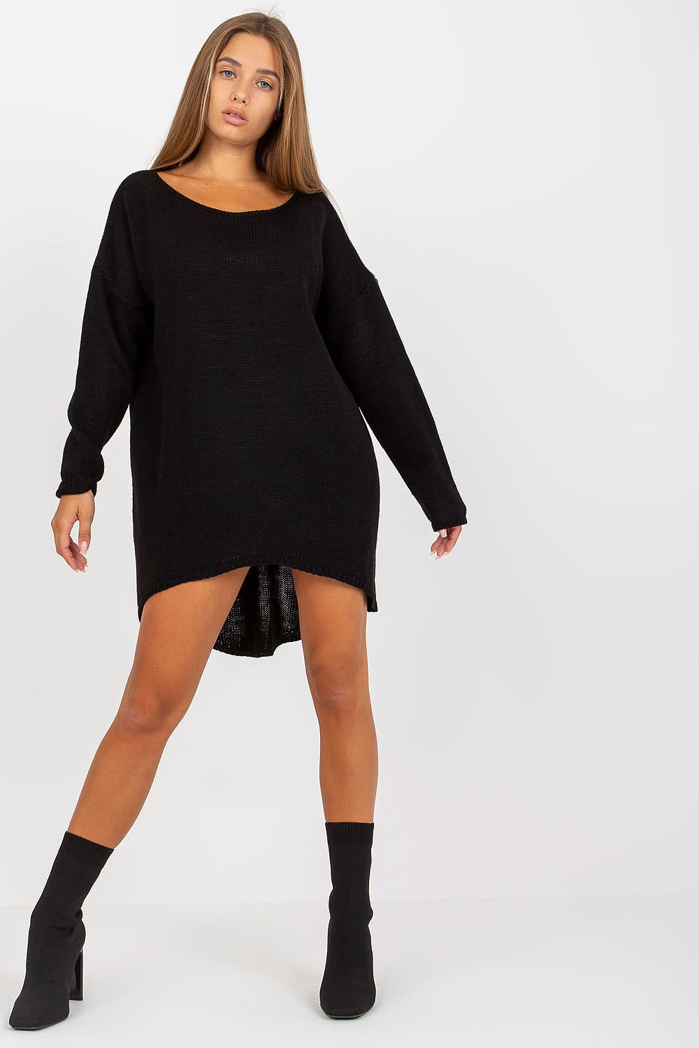 Luxury Women’s Asymmetrical Cut Sweater by Och Bella, in a classic black hue, exhibited by a confident model in a stylish pose highlighting the unique asymmetrical design.