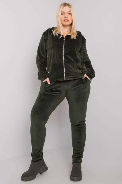 Luxurious Plus Size Velour Set: Zip-Up Hoodie and Tie-Waist Pants for Ultimate Comfort, displayed by a model in a rich green velour ensemble, featuring a chic zip-up hoodie and fitted pants for a sophisticated look.